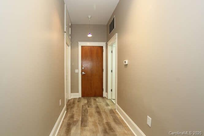 1700 Camden Road, Unit 201 Charlotte, NC 28203 - Photo 4 of 30 a view of a bathroom with a shower