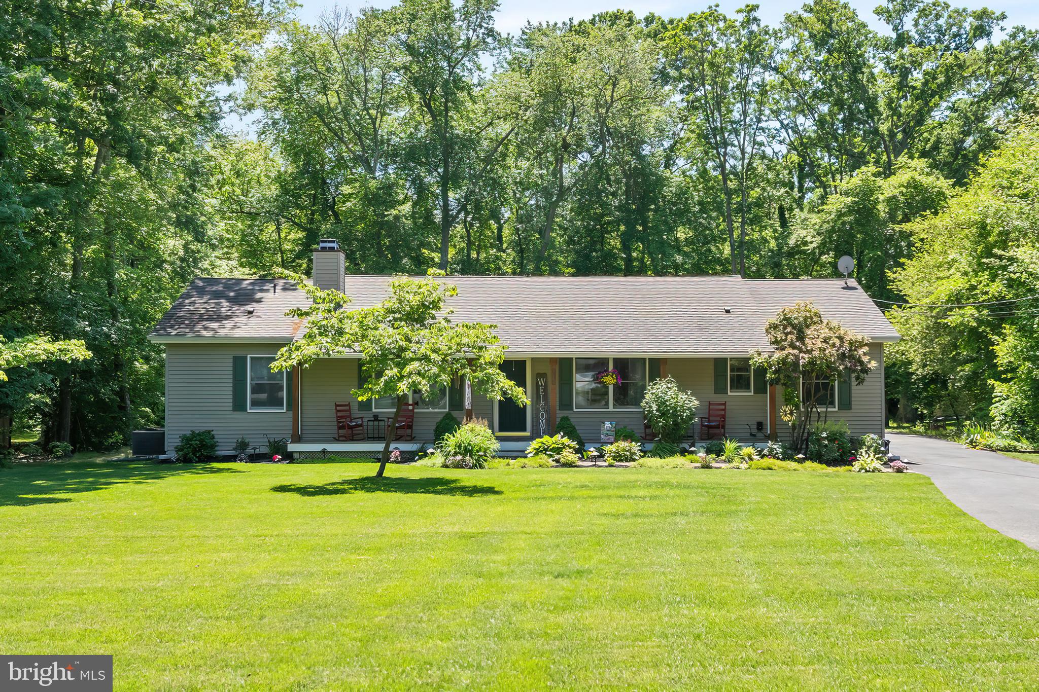 1431 Burleigh Road Cape May Court House, NJ 08210 - Photo 2 of 35 a front view of a house with yard