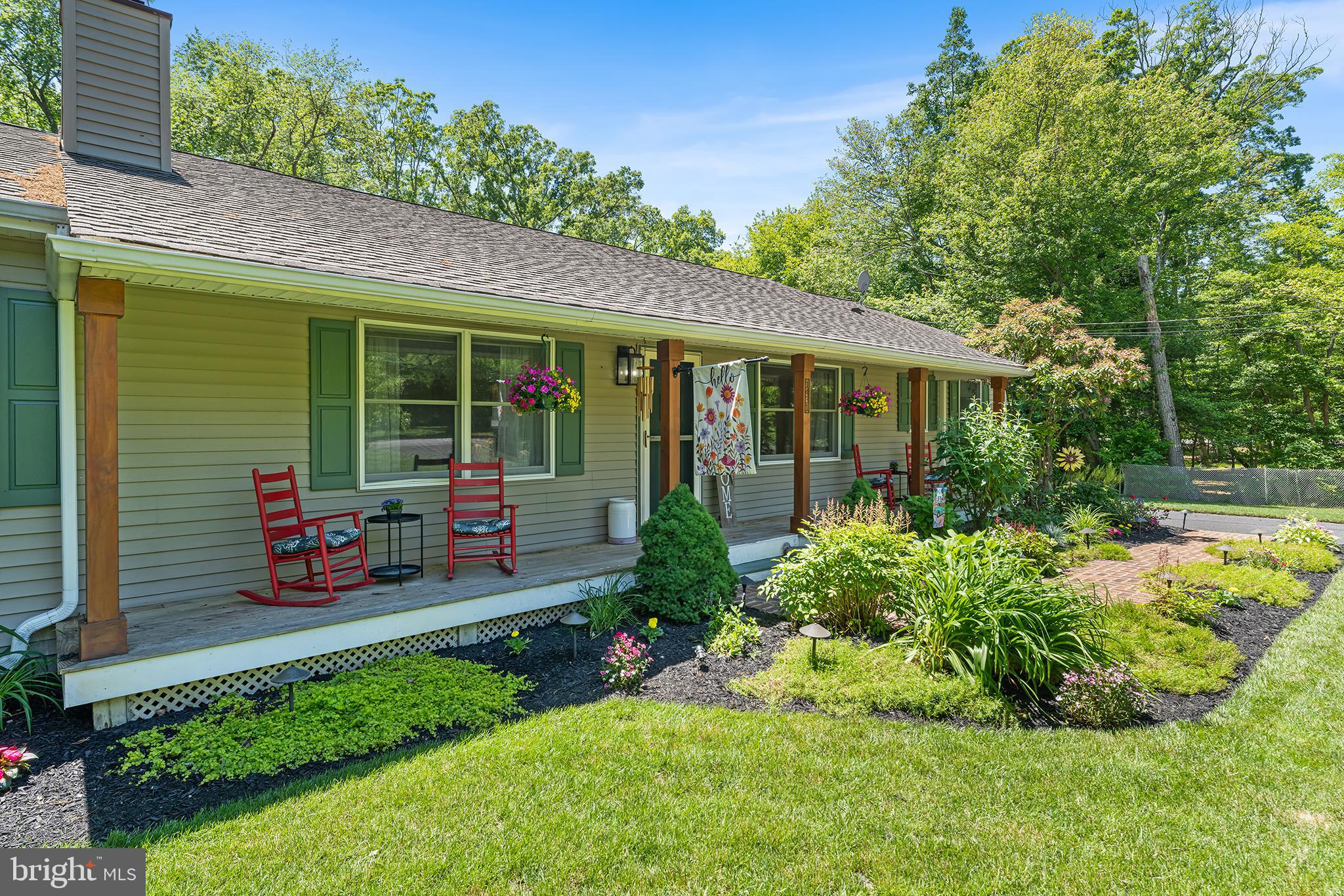 1431 Burleigh Road Cape May Court House, NJ 08210 - Photo 6 of 35 a backyard of a house with outdoor seating