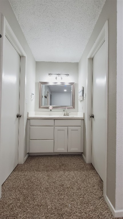 3768 Tanglewilde Street, Unit J5 Houston, TX 77063 - Photo 11 of 12 a bathroom with a sink a toilet and shower