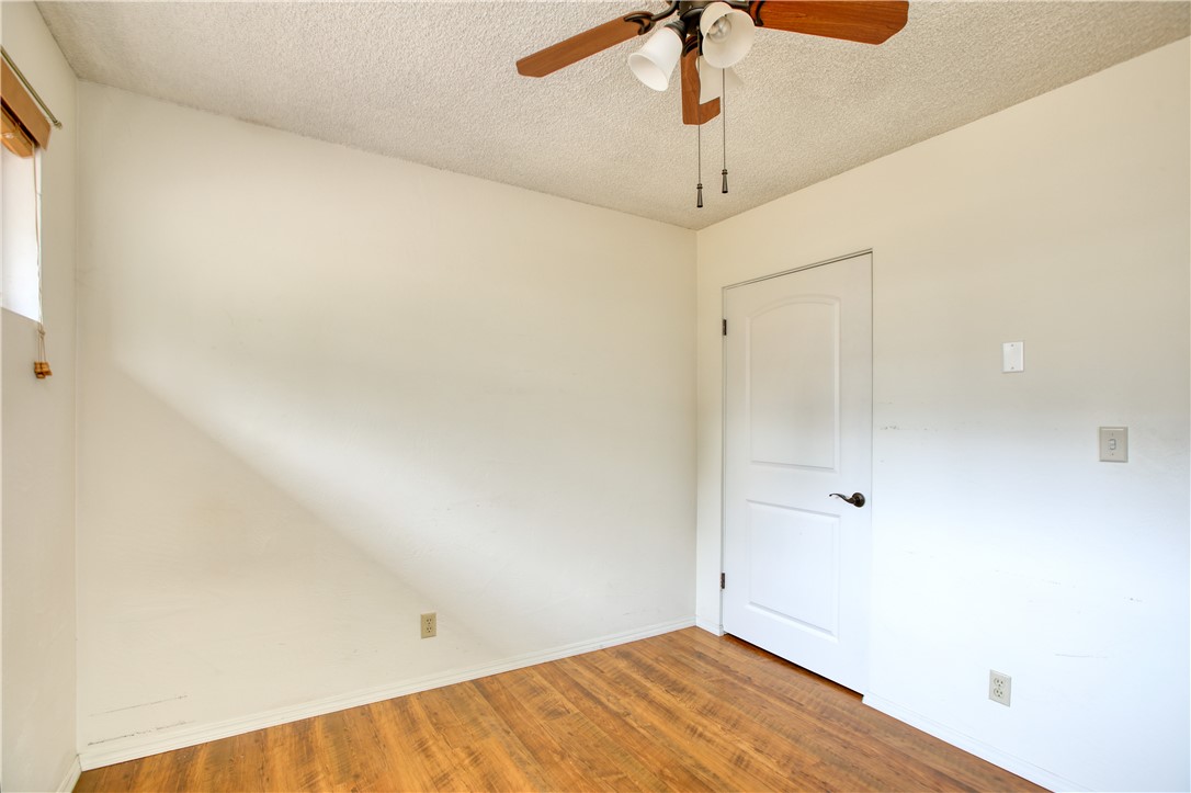 910 North 12th Street Grover Beach, CA 93433 - Photo 24 of 42 a view of a room with a ceiling fan and a shower
