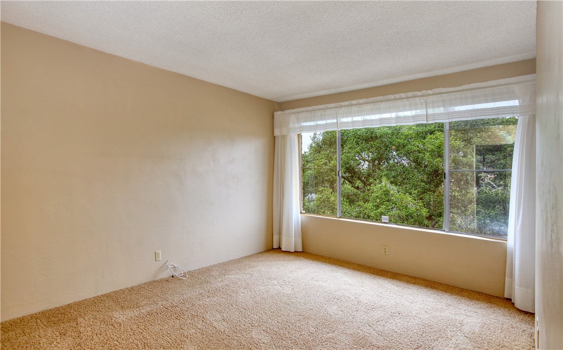 910 North 12th Street Grover Beach, CA 93433 - Photo 25 of 42 a view of an empty room with a window