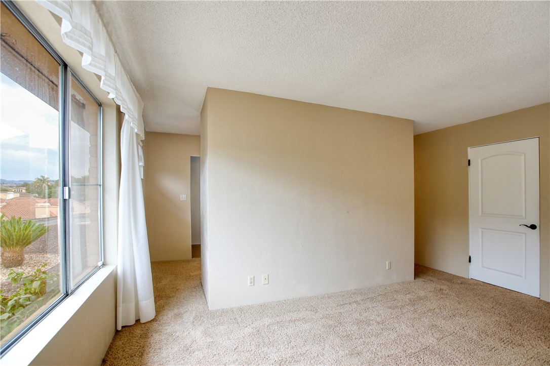 910 North 12th Street Grover Beach, CA 93433 - Photo 27 of 42 an empty room with windows