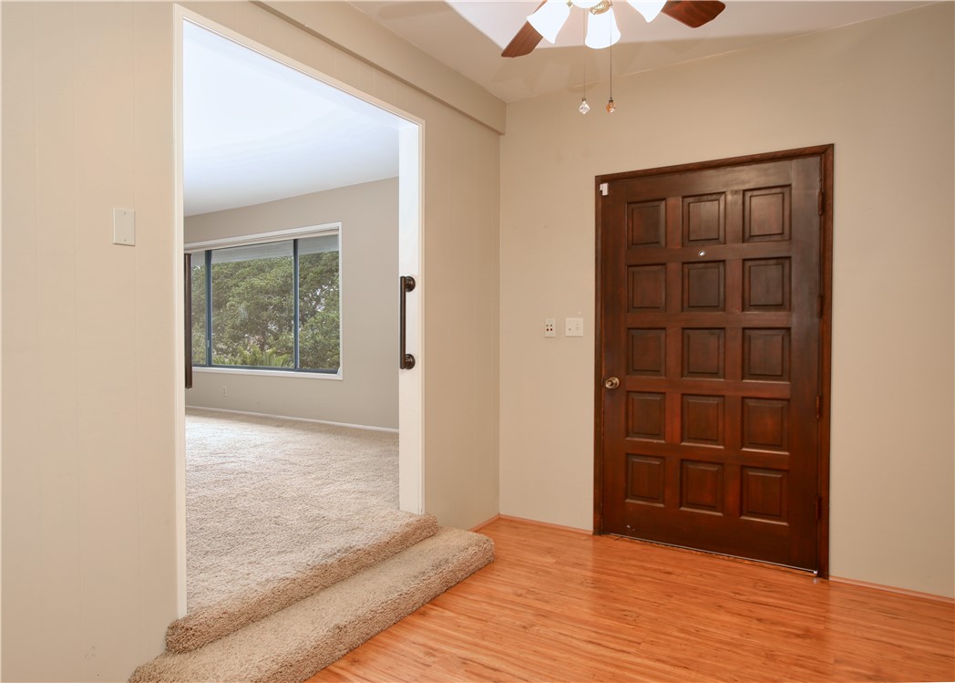 910 North 12th Street Grover Beach, CA 93433 - Photo 8 of 42 an empty room with closet and a chandelier fan