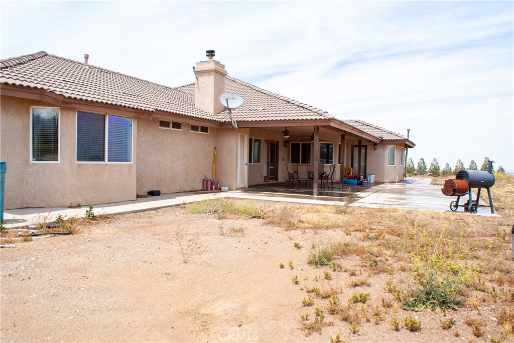 8465 Cedar Court Phelan, CA 92371 - Photo 13 of 51 a front view of a house with a yard