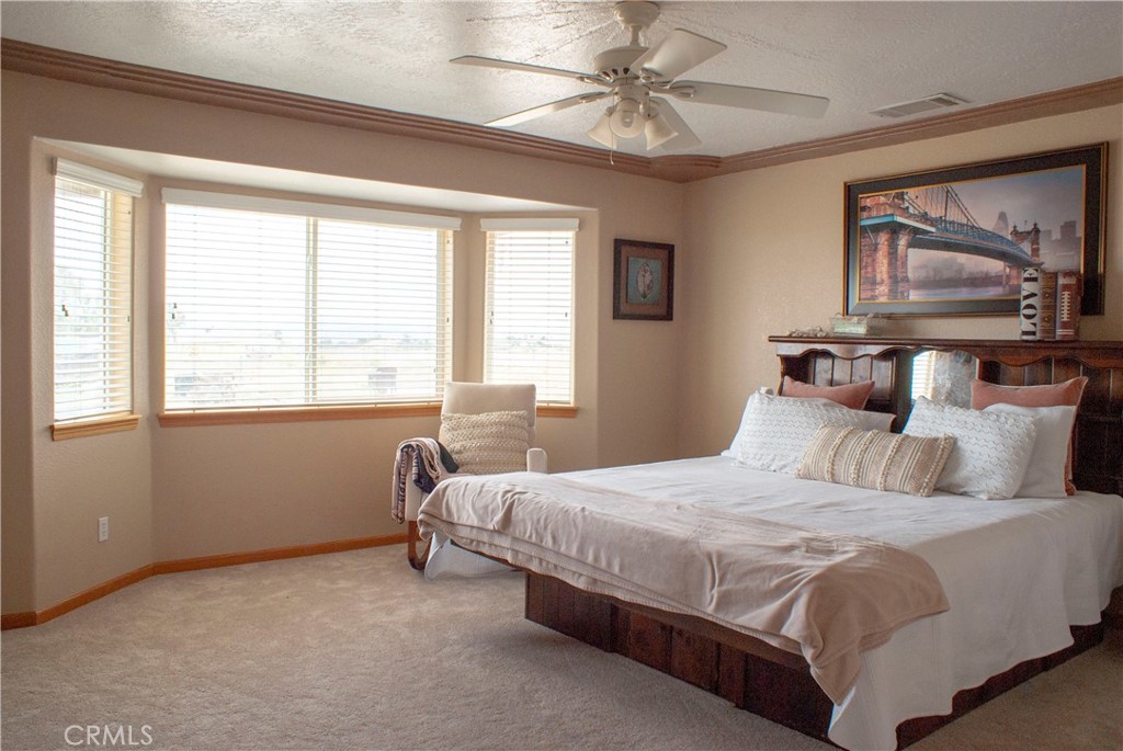 8465 Cedar Court Phelan, CA 92371 - Photo 17 of 51 a bedroom with a bed and a window