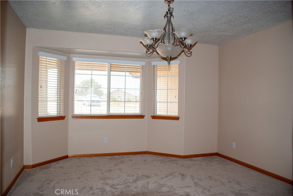 8465 Cedar Court Phelan, CA 92371 - Photo 25 of 51 an empty room with a window