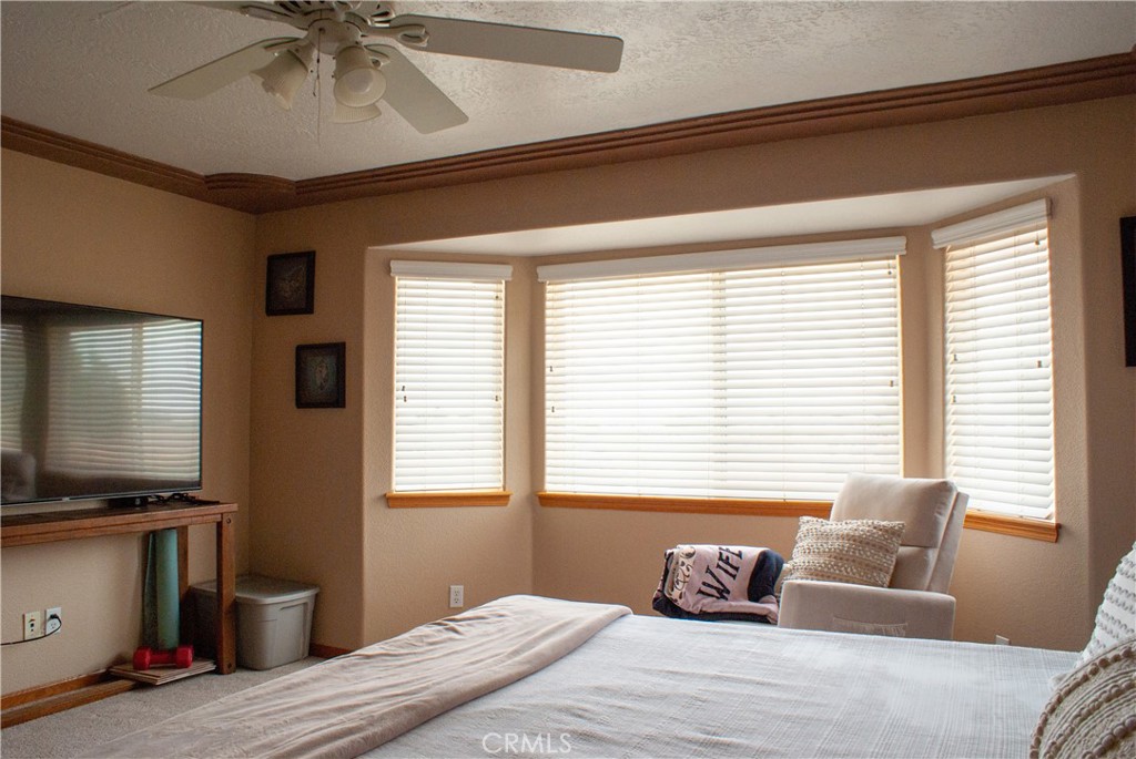 8465 Cedar Court Phelan, CA 92371 - Photo 27 of 51 a bedroom with a bed and a window