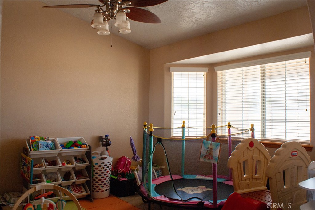 8465 Cedar Court Phelan, CA 92371 - Photo 29 of 51 a bed room with a bed and a window