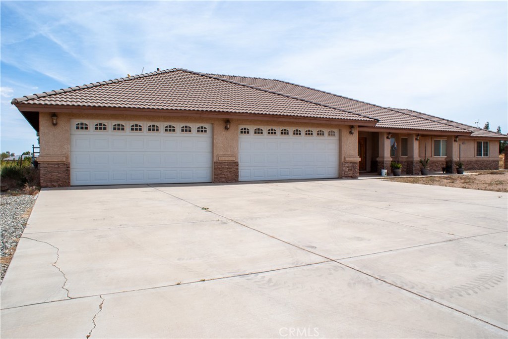 8465 Cedar Court Phelan, CA 92371 - Photo 3 of 51 a front view of building with yard