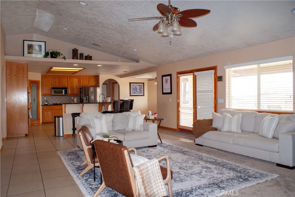 8465 Cedar Court Phelan, CA 92371 - Photo 38 of 51 a living room with furniture and a large window