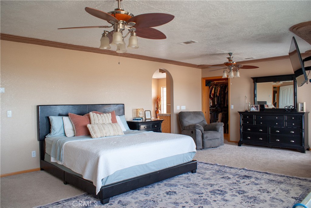 8465 Cedar Court Phelan, CA 92371 - Photo 44 of 51 a bedroom with a bed and a dresser