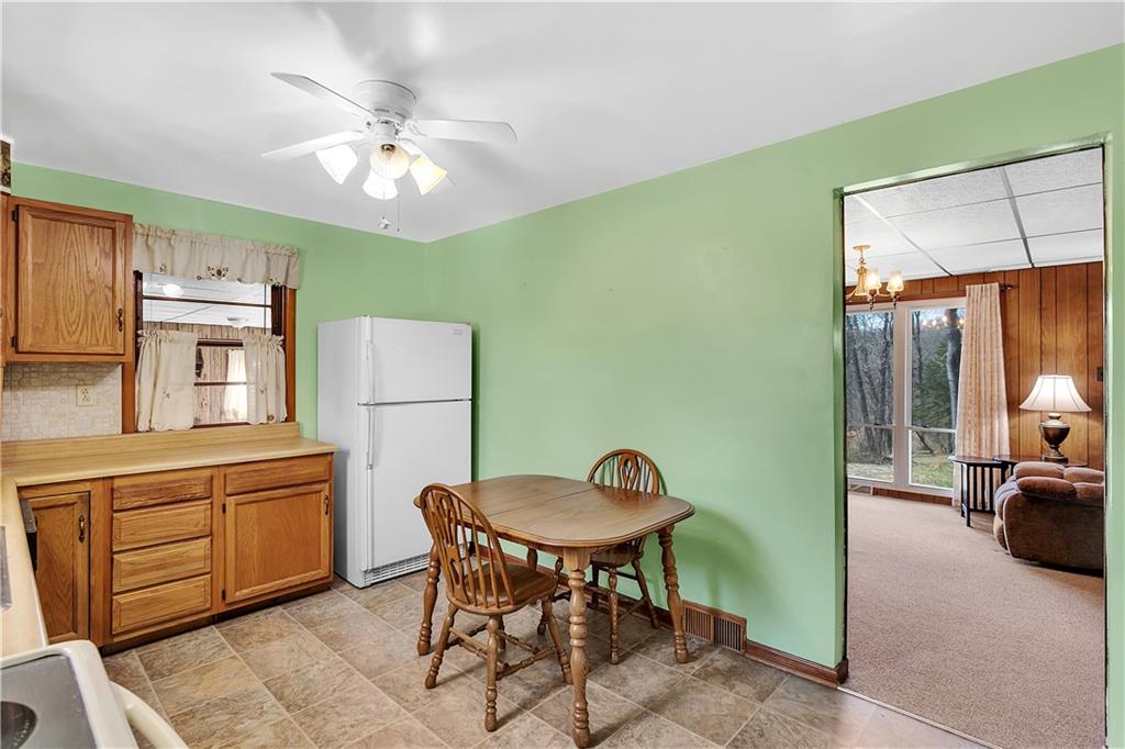 523 Allendale Road Rochester, PA 15074 - Photo 13 of 34 a view of a dining room with furniture and chandelier