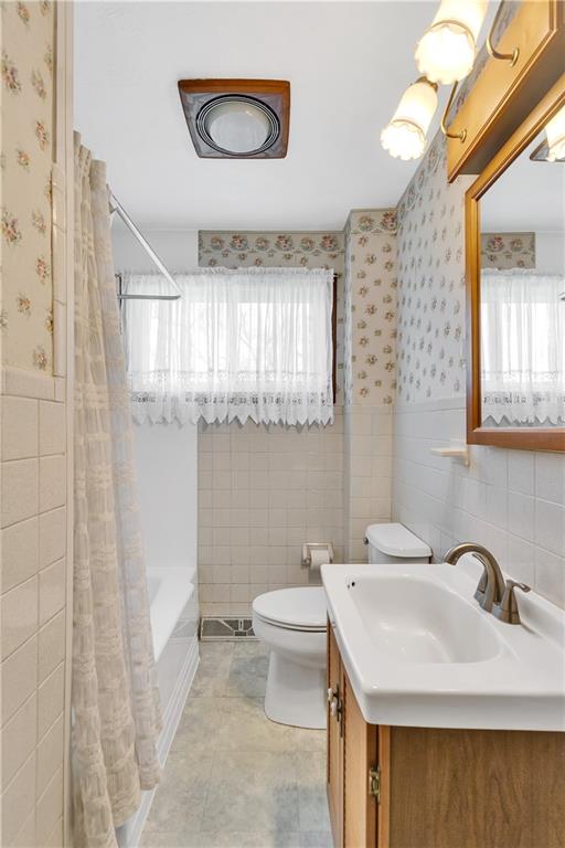 523 Allendale Road Rochester, PA 15074 - Photo 22 of 34 a bathroom with a sink a toilet and a mirror