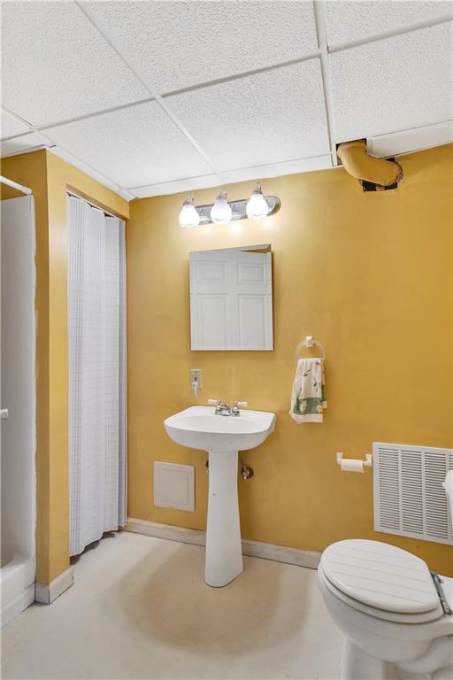 523 Allendale Road Rochester, PA 15074 - Photo 26 of 34 a bathroom with a sink a toilet and mirror