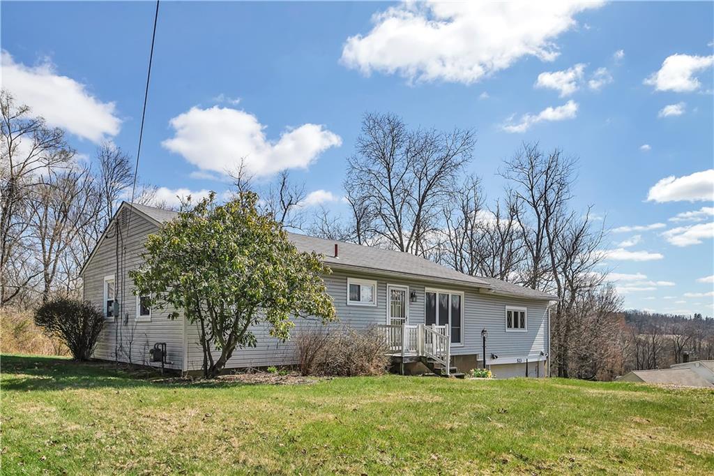 523 Allendale Road Rochester, PA 15074 - Photo 34 of 34 a front view of house with yard and trees