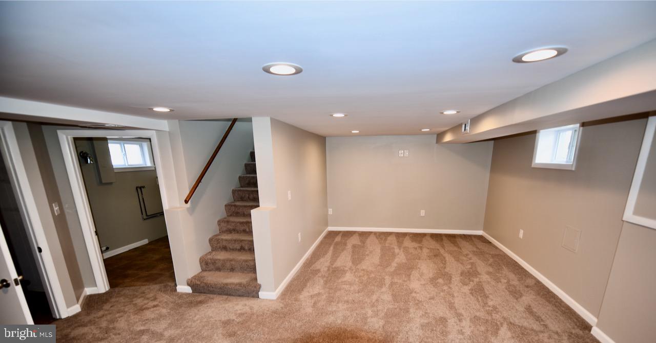400 Pasadena Road Pasadena, MD 21122 - Photo 33 of 54 Finished basement main area