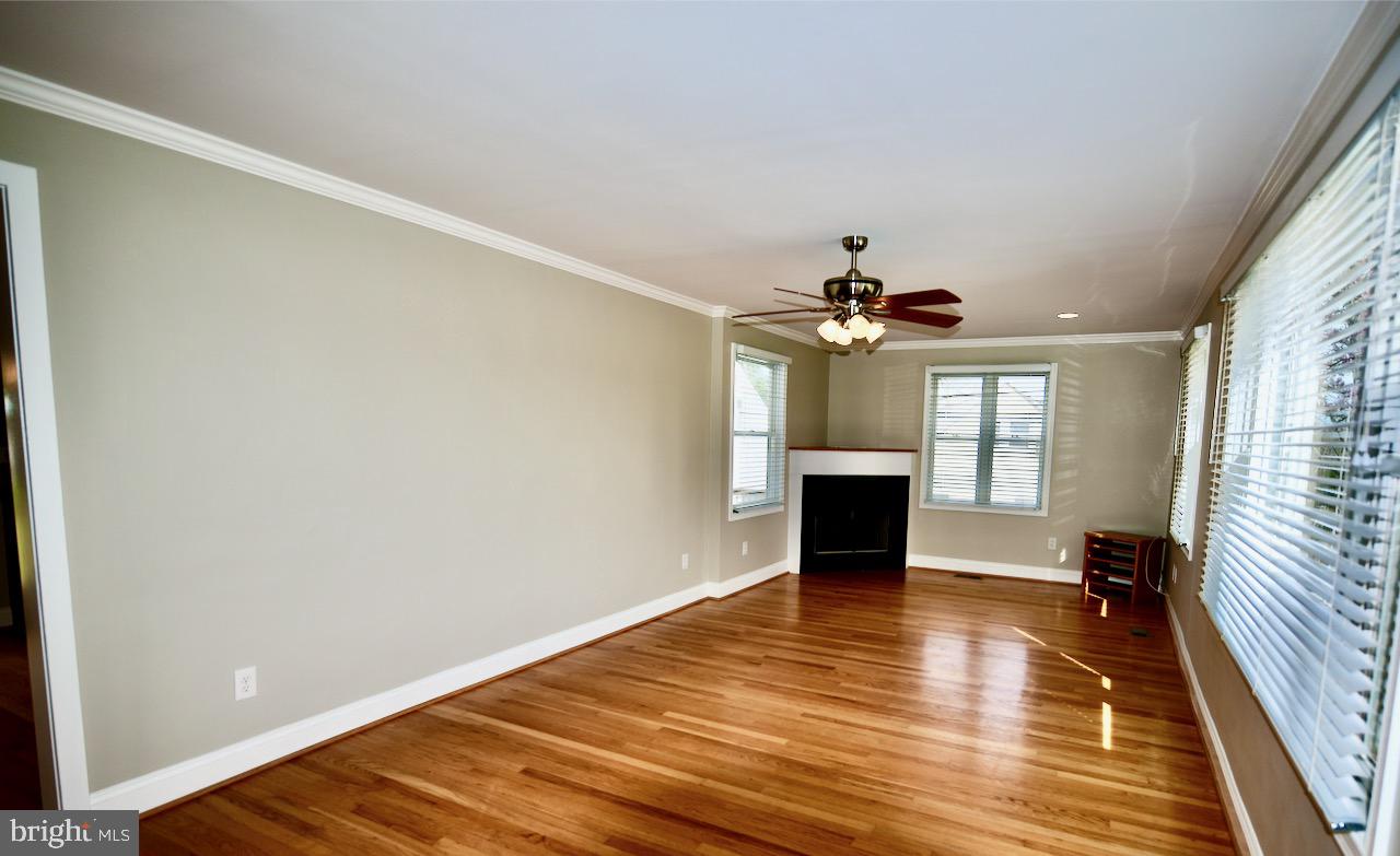 400 Pasadena Road Pasadena, MD 21122 - Photo 10 of 54 Living room with gas fireplace