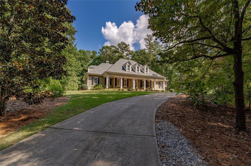 Elegantly Understated Cape Cod on 1.59 Gated, Wooded Lot, With Gorgeous Pool