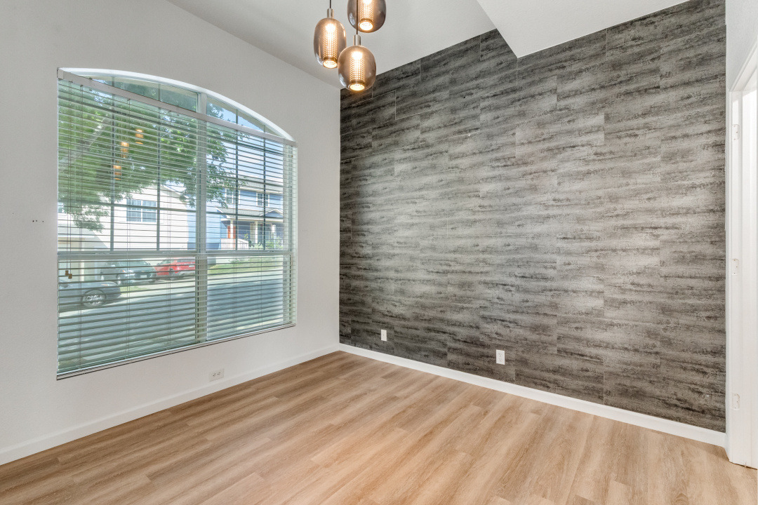 9204 Magna Carta Loop Austin, TX 78754 - Photo 17 of 27 Entry Office with an accent wall and light wood-type flooring