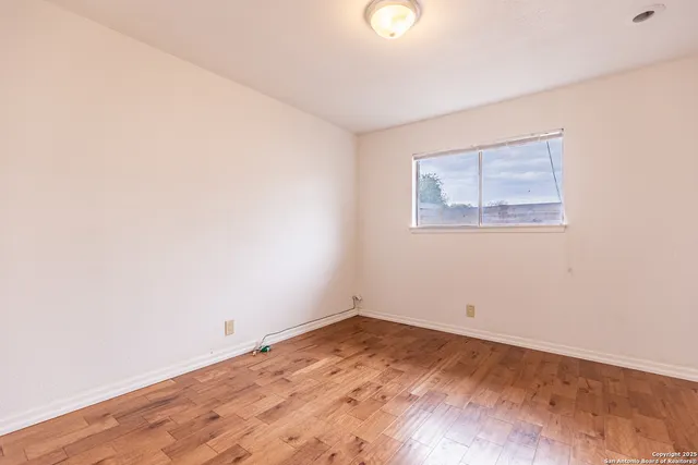 an empty room with a workspace