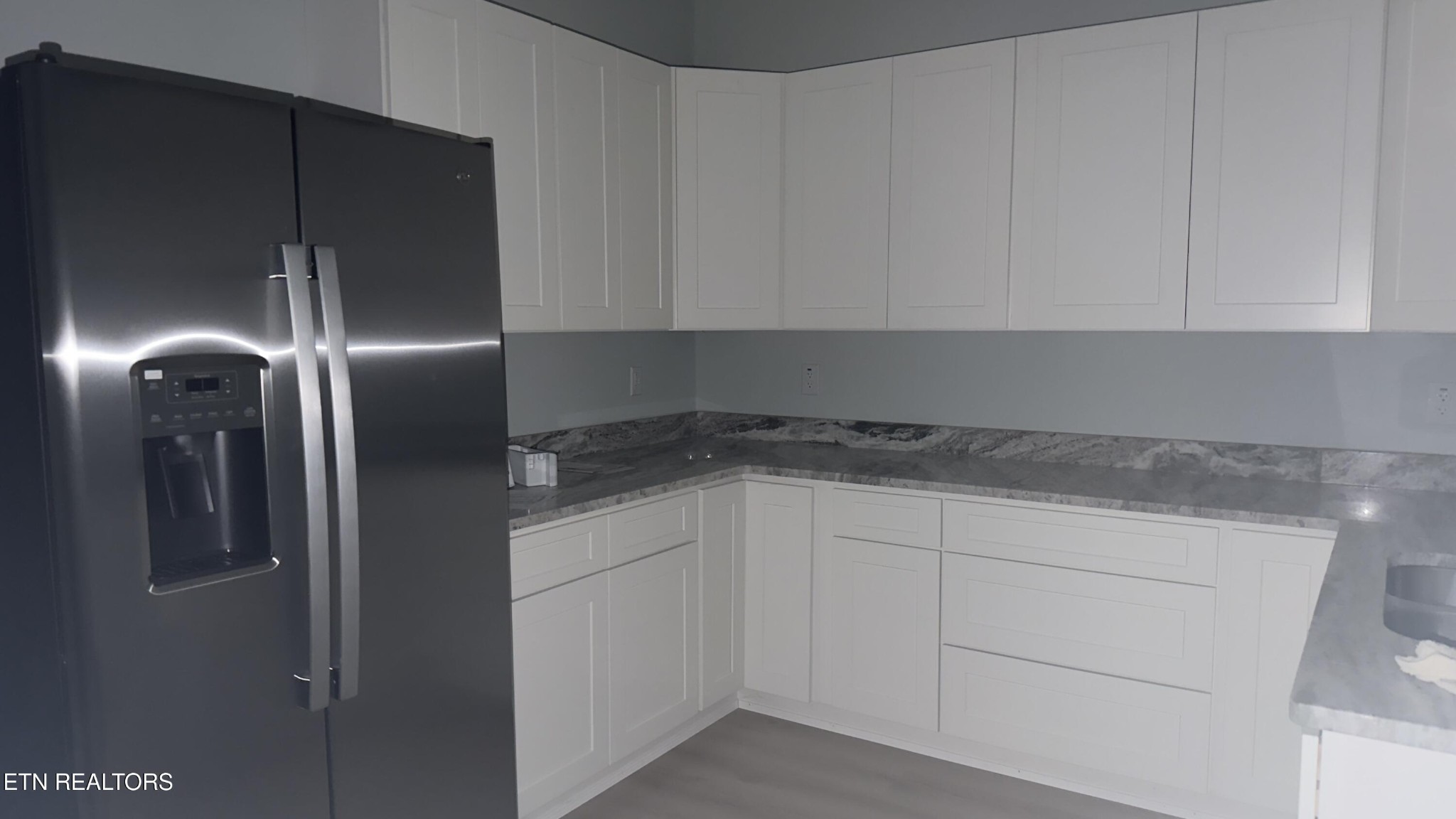 2662 Louisville Road Maryville, TN 37801 - Photo 56 of 60 a kitchen with cabinets and stainless steel appliances