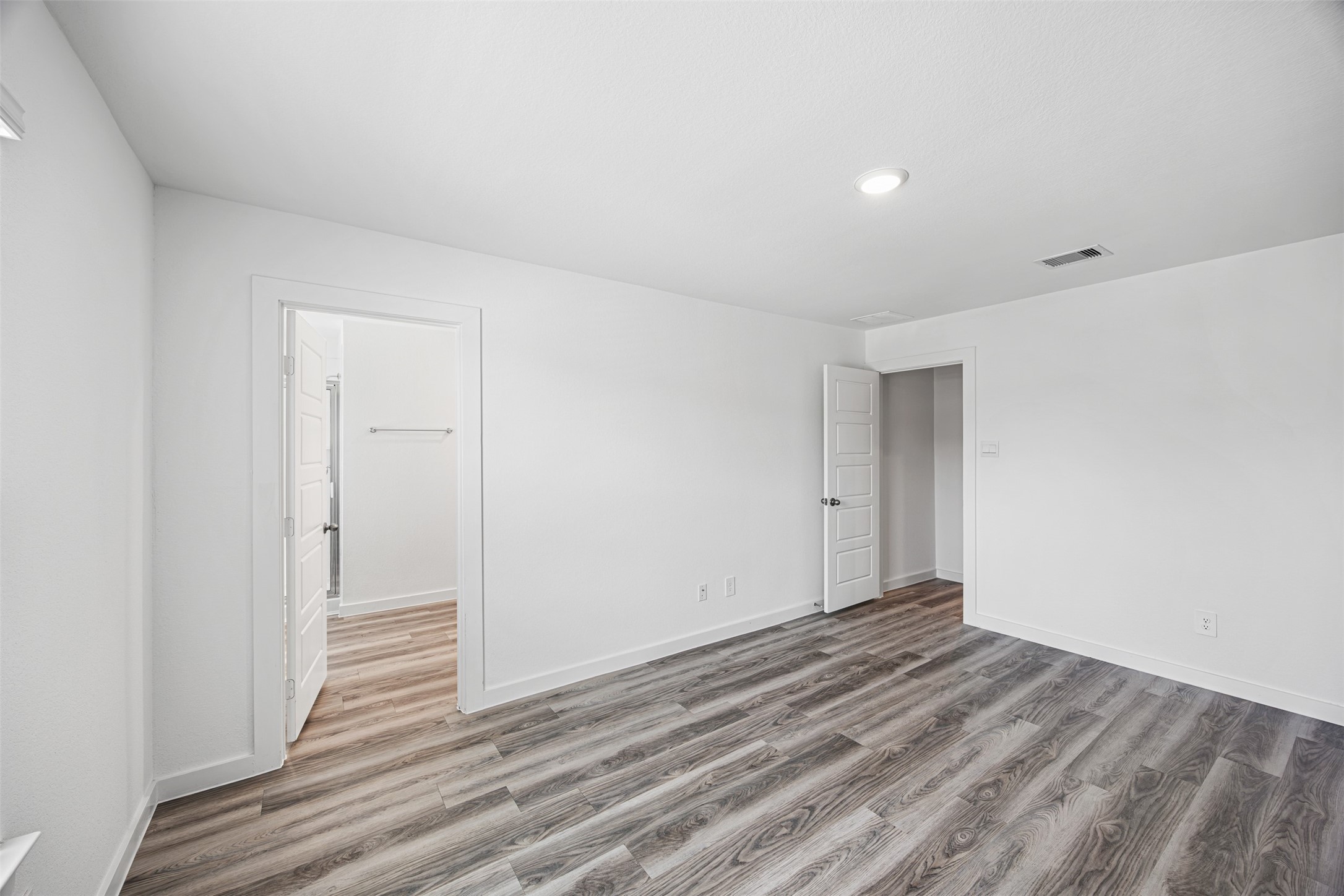 12305 Brandenburg Gate Road Houston, TX 77047 - Photo 11 of 22 a view of a room with wooden floor