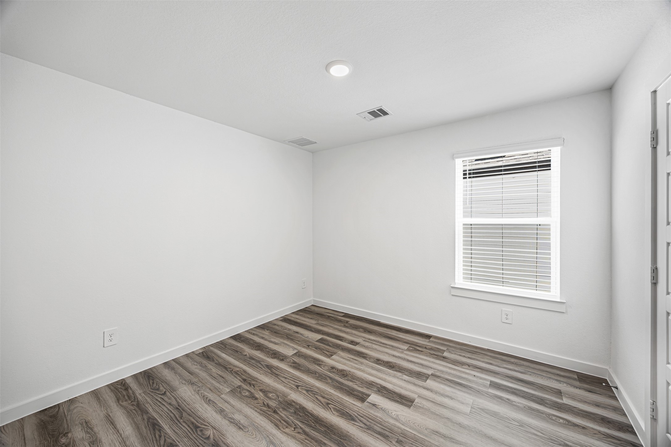 12305 Brandenburg Gate Road Houston, TX 77047 - Photo 15 of 22 a view of a room that has a window in it