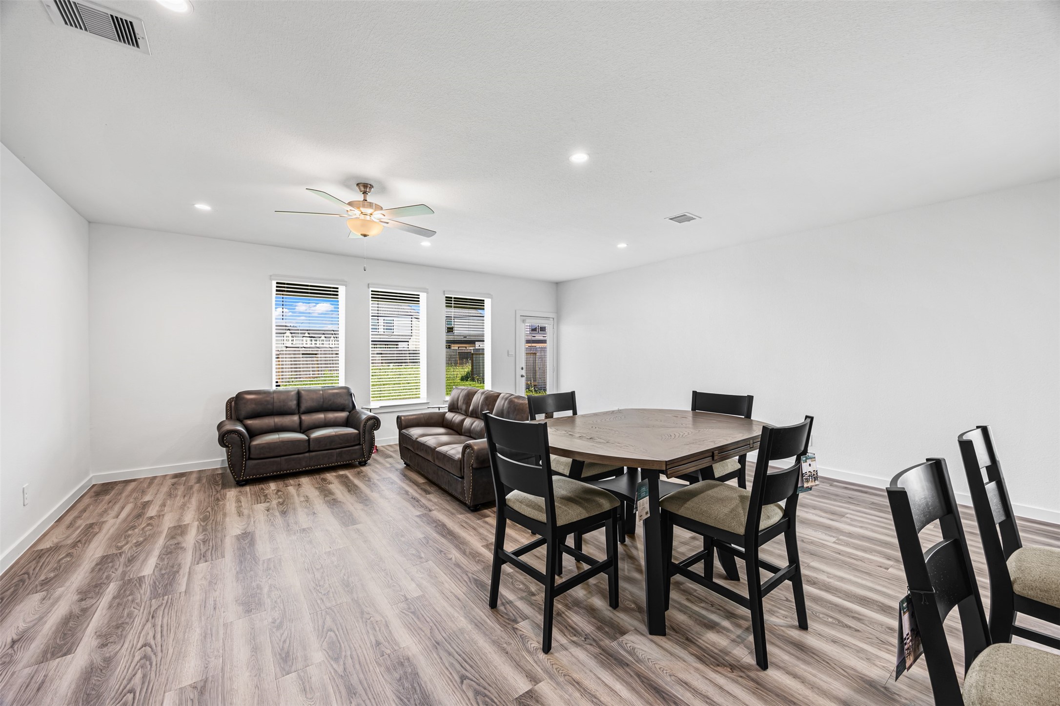 12305 Brandenburg Gate Road Houston, TX 77047 - Photo 7 of 22 a living room with furniture and wooden floor