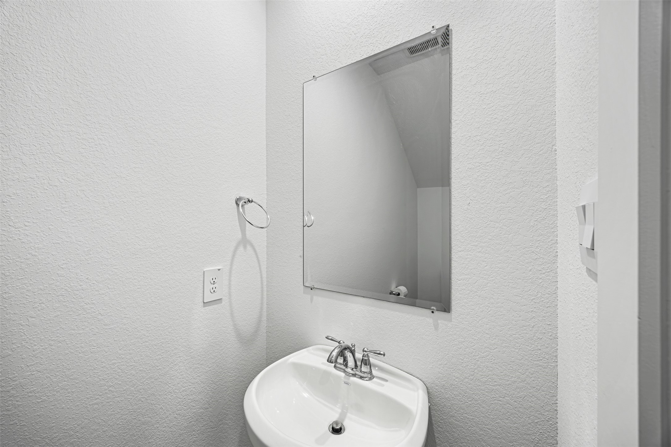 12305 Brandenburg Gate Road Houston, TX 77047 - Photo 8 of 22 a bathroom with a sink and mirror