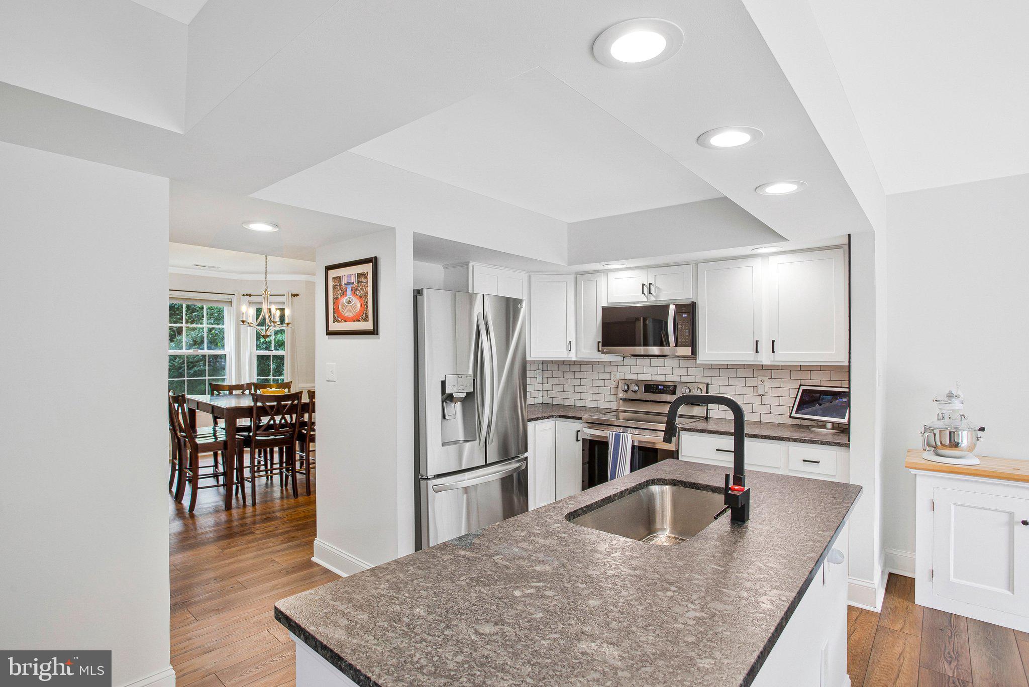 1582 Snug Harbor Road Shady Side, MD 20764 - Photo 18 of 53 Modern kitchen with sleek finishes.