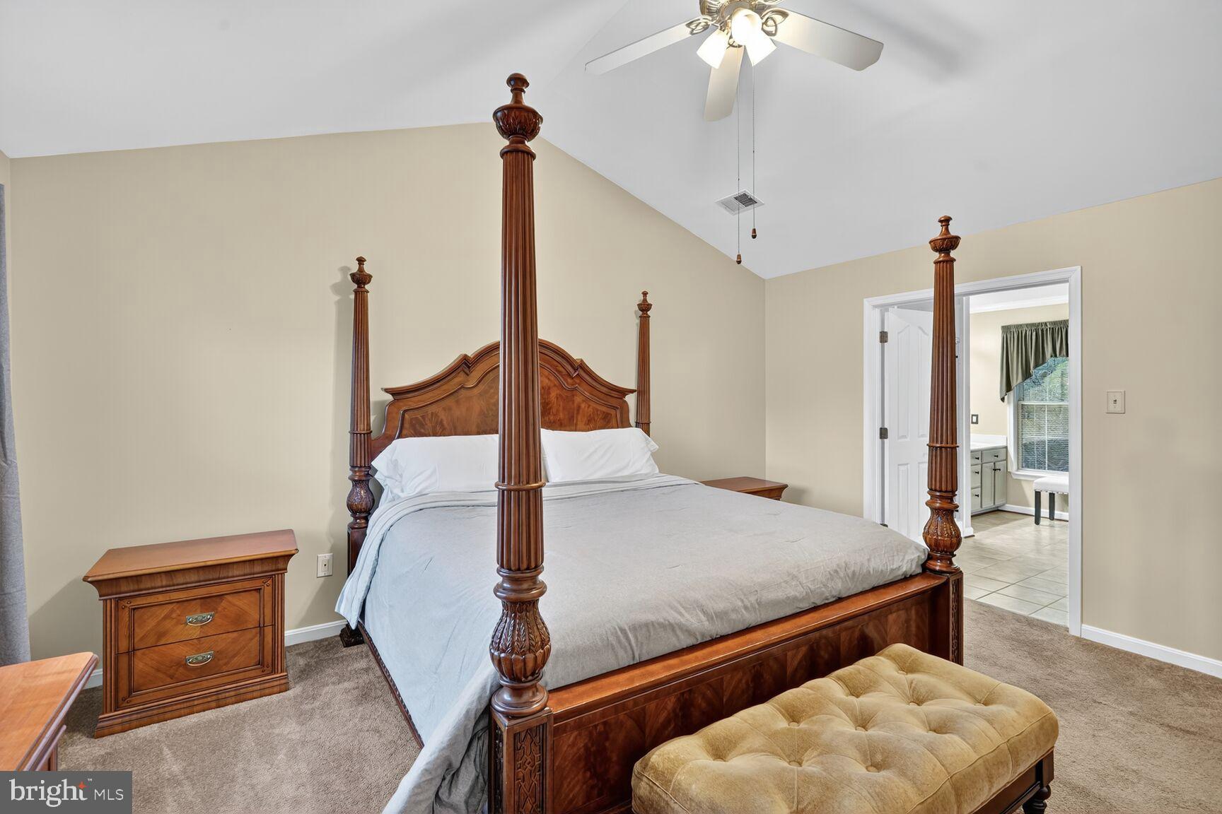 8205 Swamp Rose Place Laurel, MD 20724 - Photo 14 of 34 a bed room with furniture and wooden floor