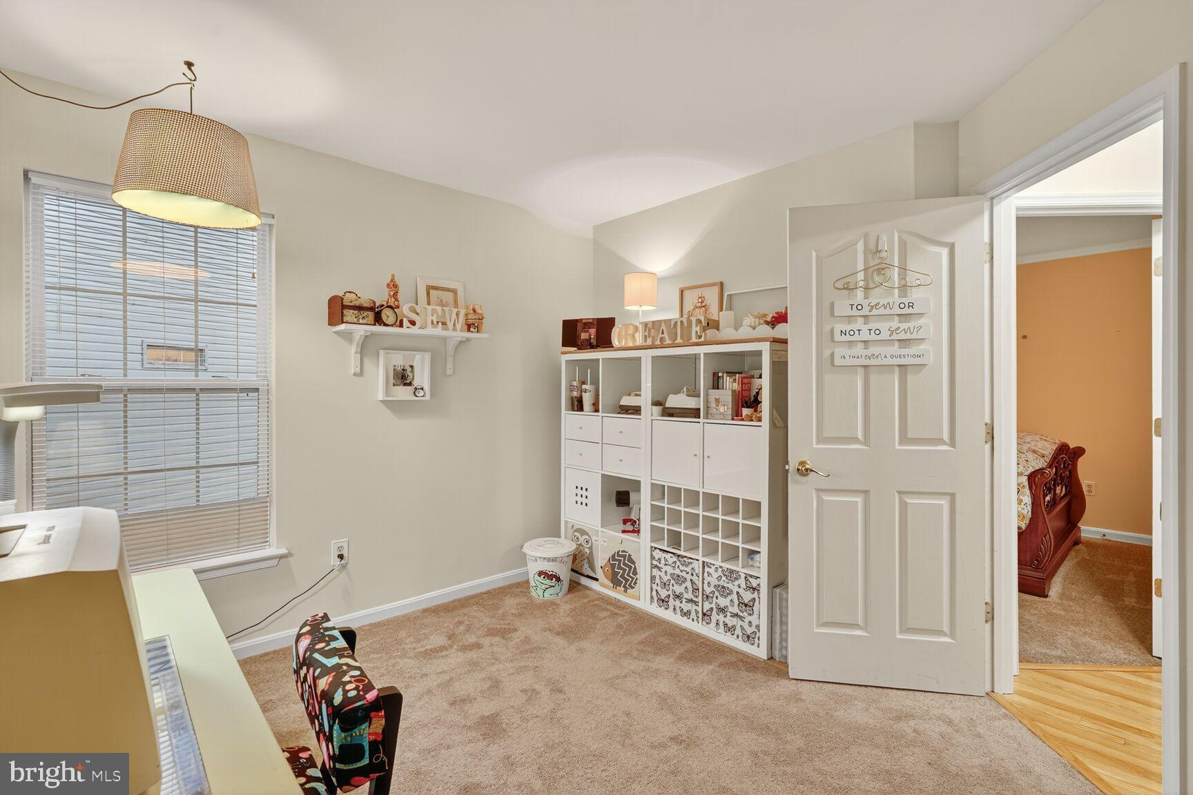 8205 Swamp Rose Place Laurel, MD 20724 - Photo 22 of 34 a view of livingroom with furniture and storage