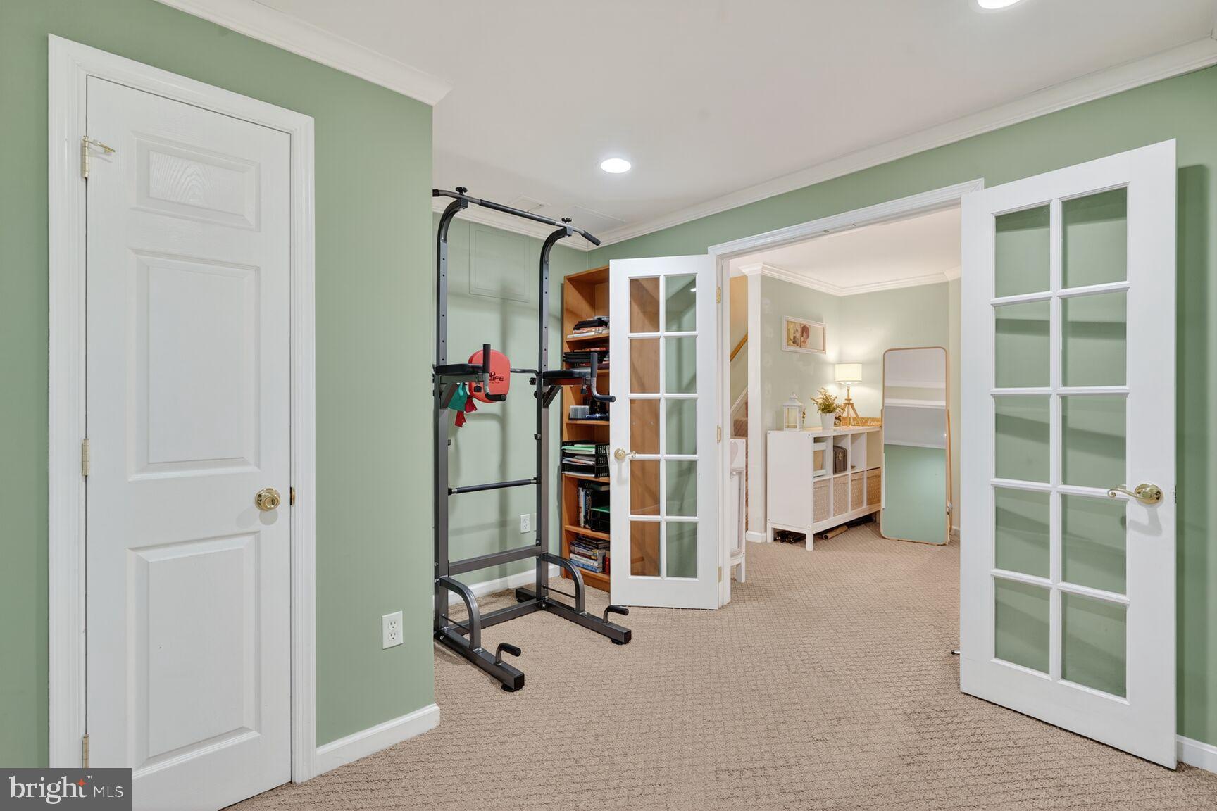 8205 Swamp Rose Place Laurel, MD 20724 - Photo 28 of 34 a view of a room with gym equipment