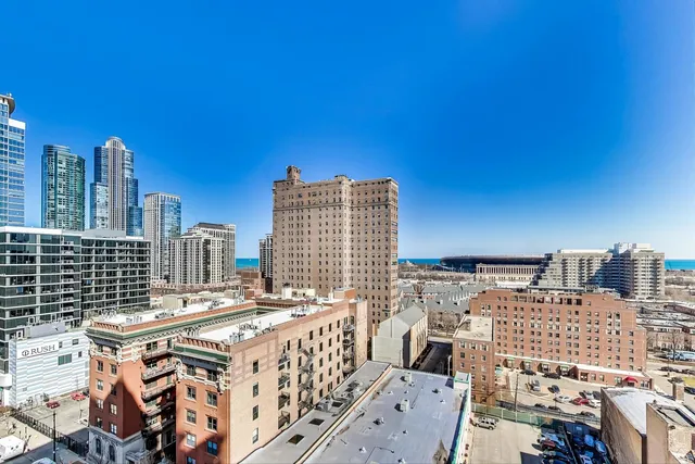 a view of city with tall buildings
