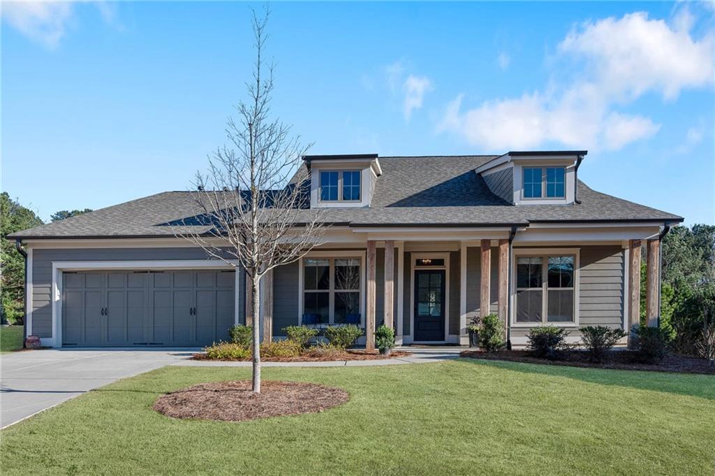 a house view with a garden space