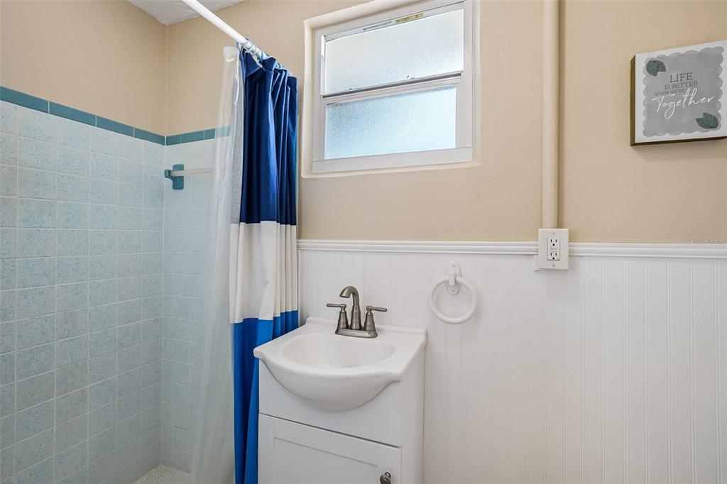 7215 Mayfield Drive Port Richey, FL 34668 - Photo 44 of 52 a bathroom with a sink a toilet and shower