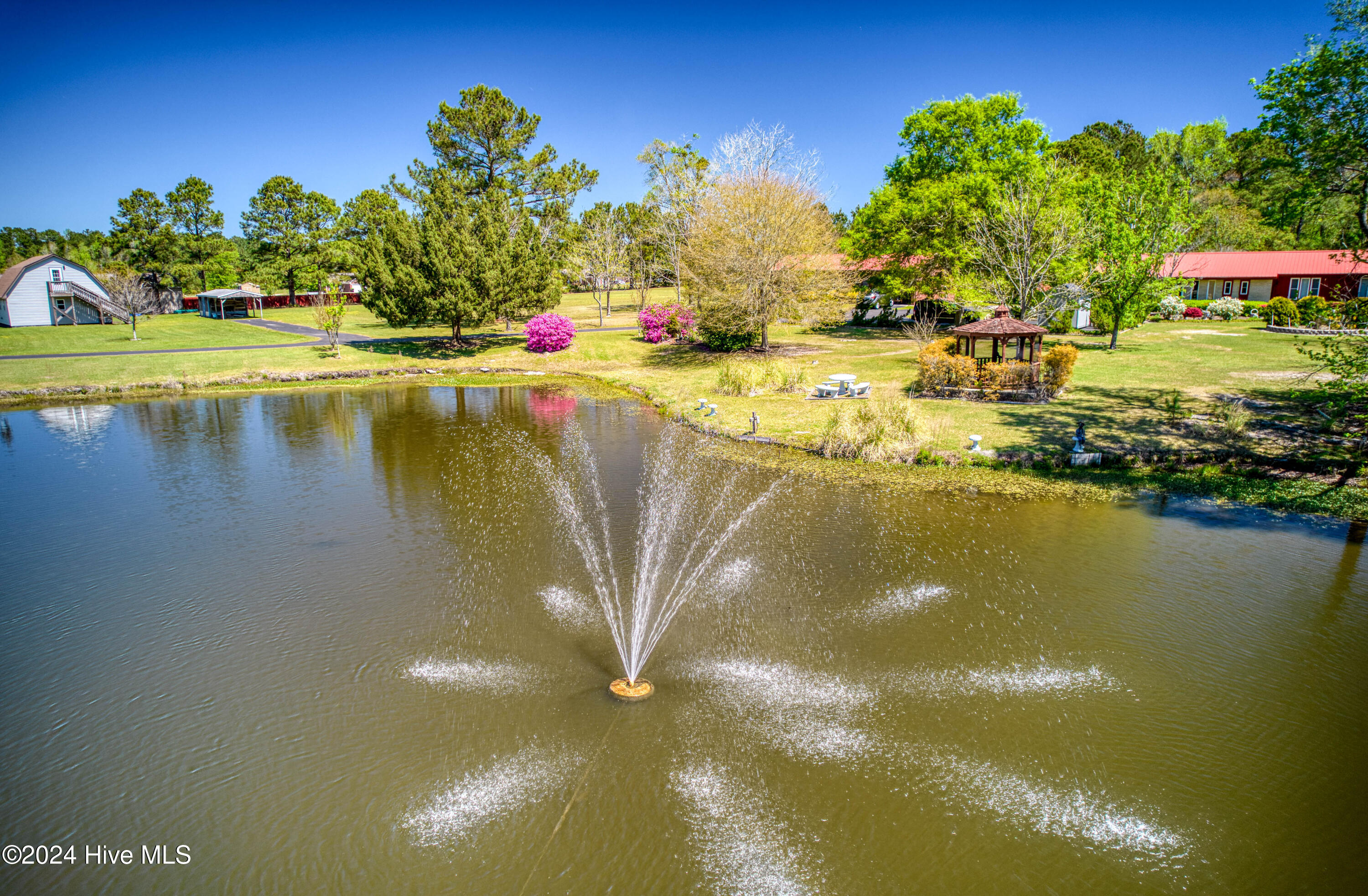 627 Fire Tower Road Richlands, NC 28574 - Photo 2 of 43 Pond fountain view