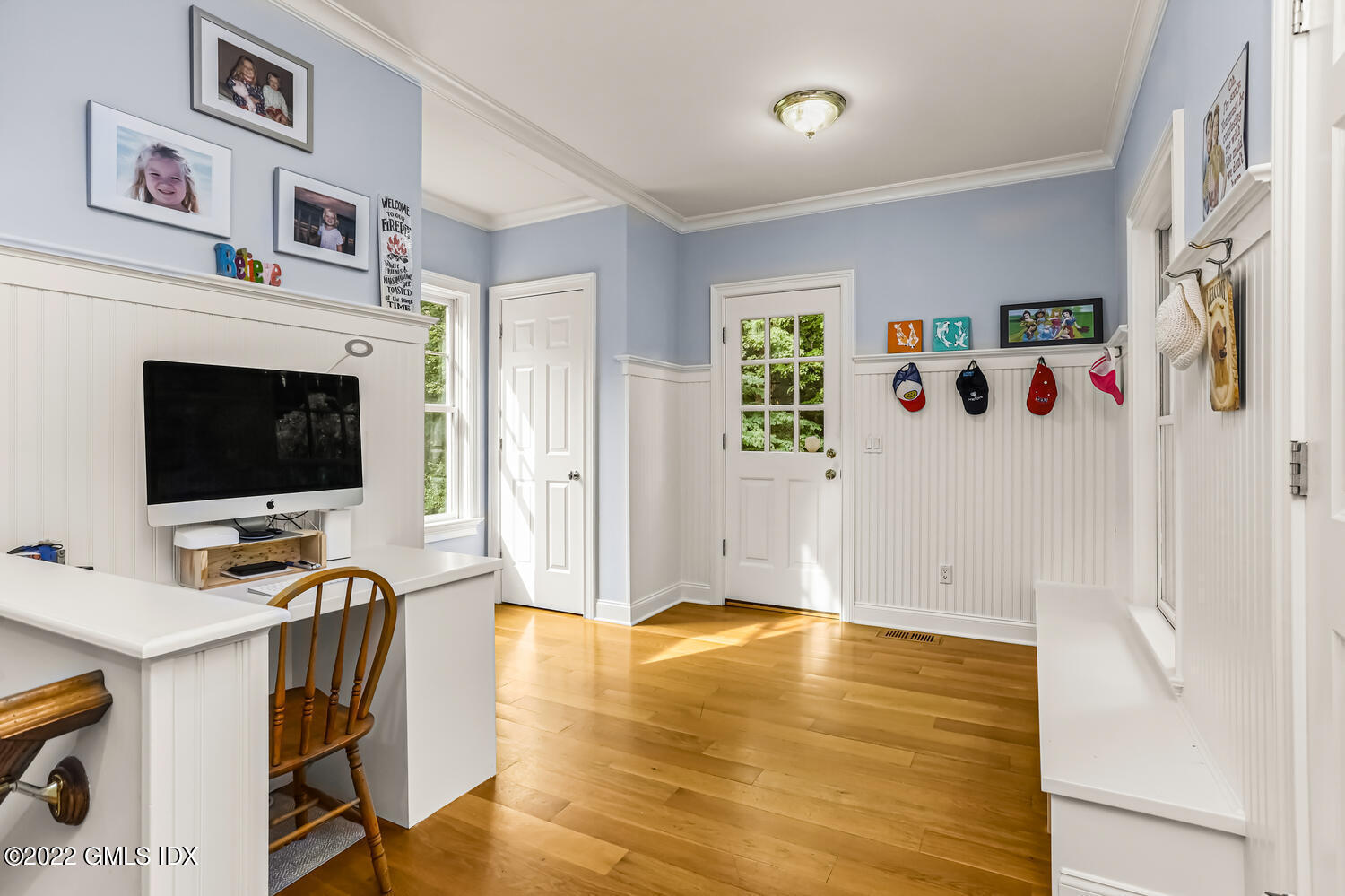 29 Old Oak Road Darien, CT 06820 - Photo 15 of 32 a view of a livingroom with workspace and a flat screen tv