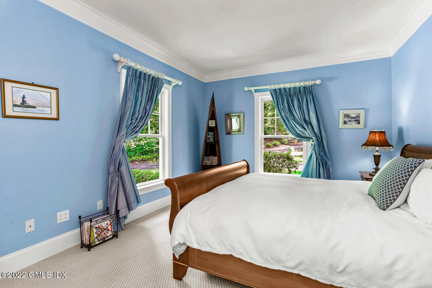 29 Old Oak Road Darien, CT 06820 - Photo 17 of 32 a bedroom with a bed and a window