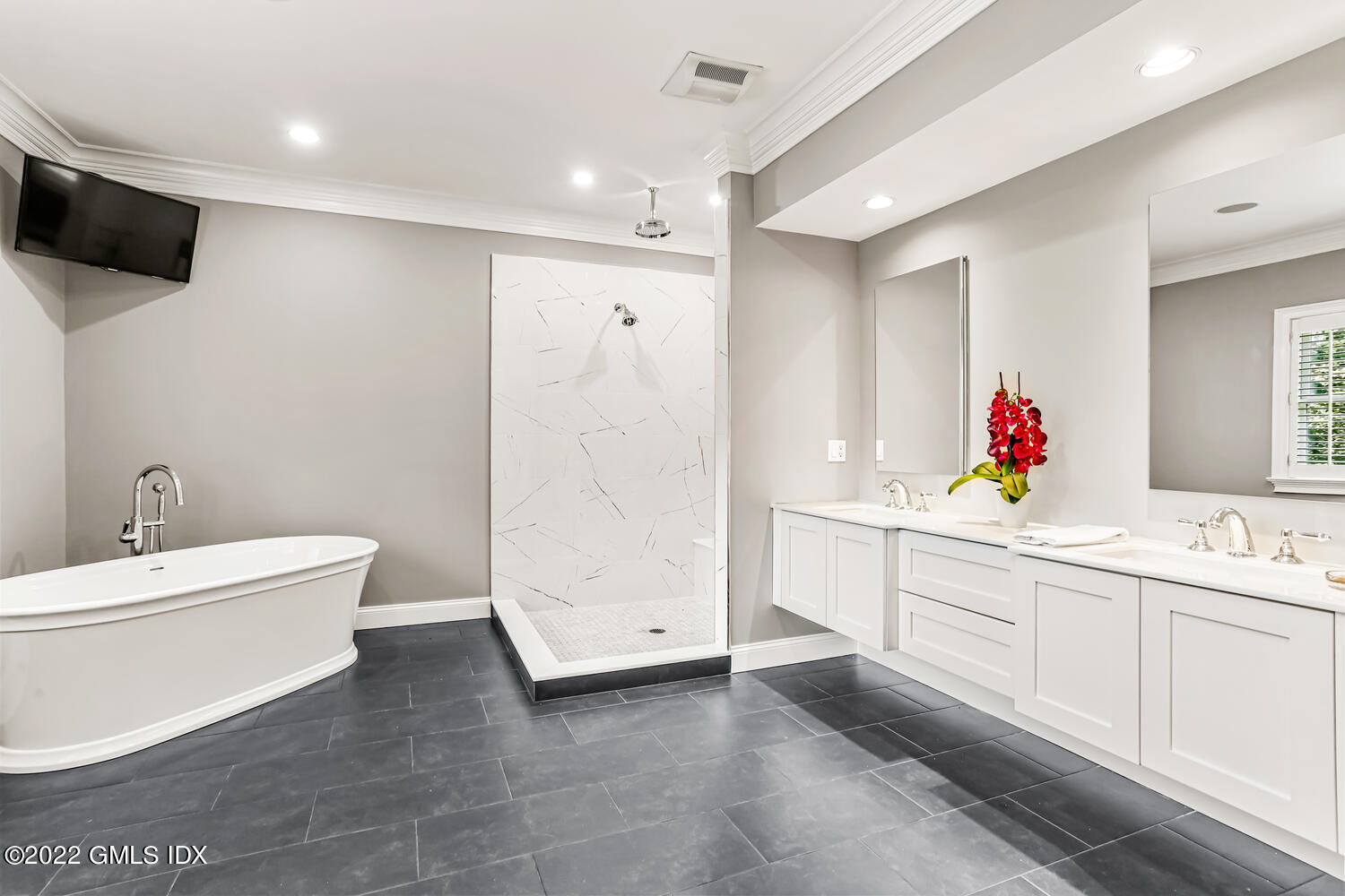 29 Old Oak Road Darien, CT 06820 - Photo 20 of 32 a bathroom with a double vanity sink mirror and toilet