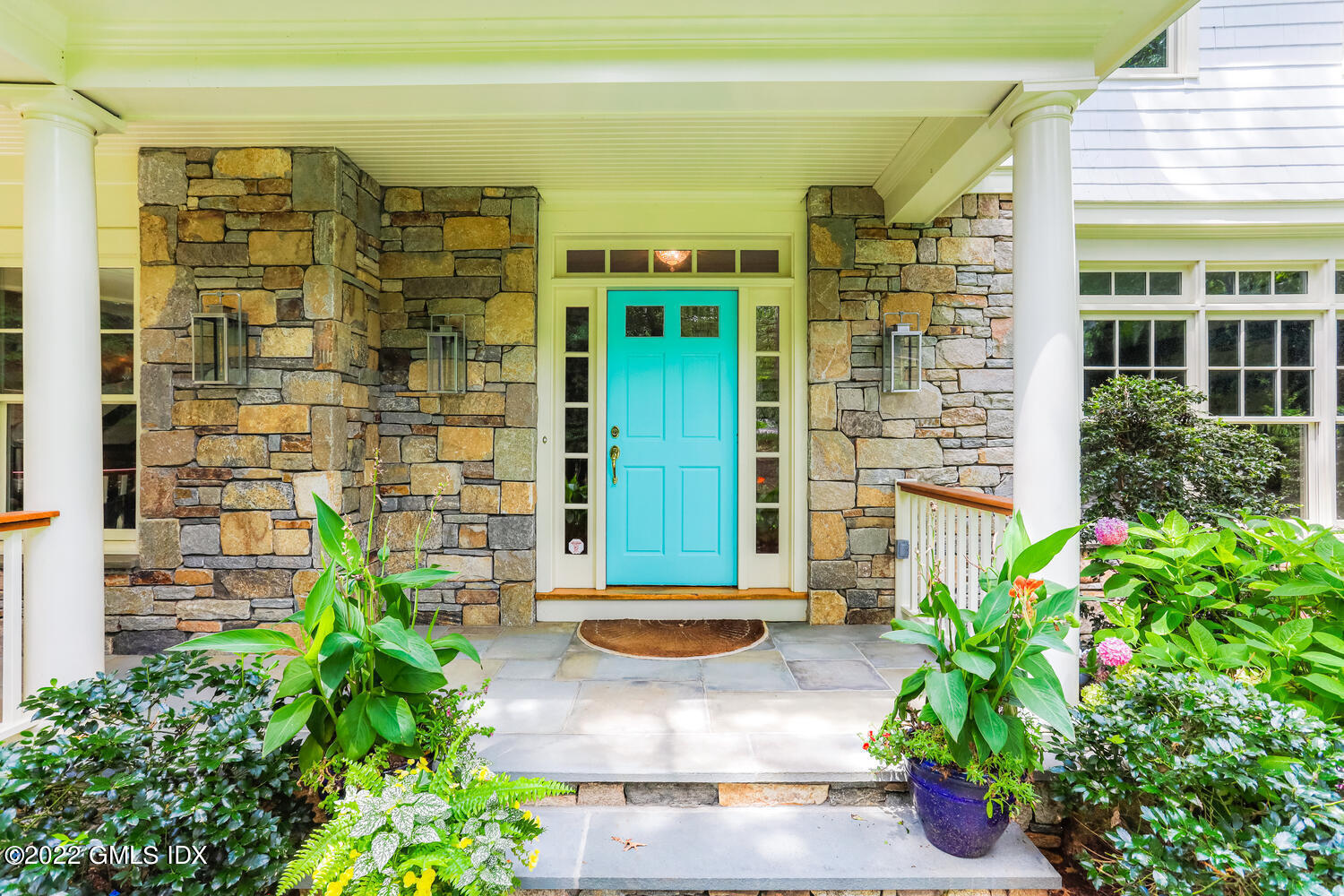 29 Old Oak Road Darien, CT 06820 - Photo 2 of 32 a view of a building with a potted plant