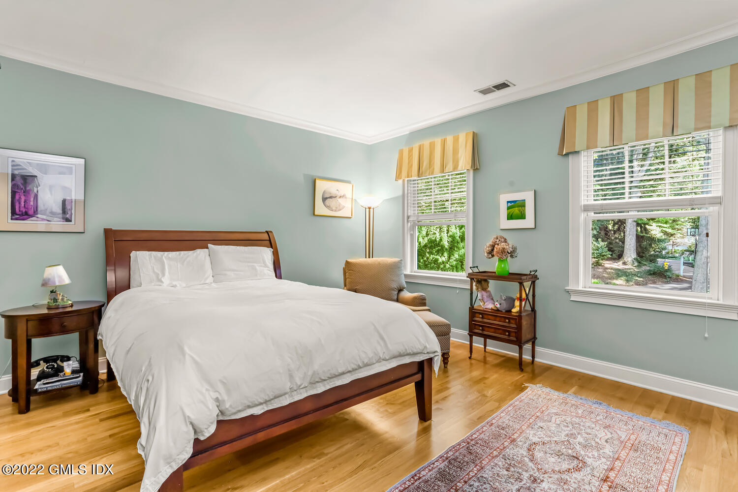 29 Old Oak Road Darien, CT 06820 - Photo 25 of 32 a bedroom with a bed and a table in it with window