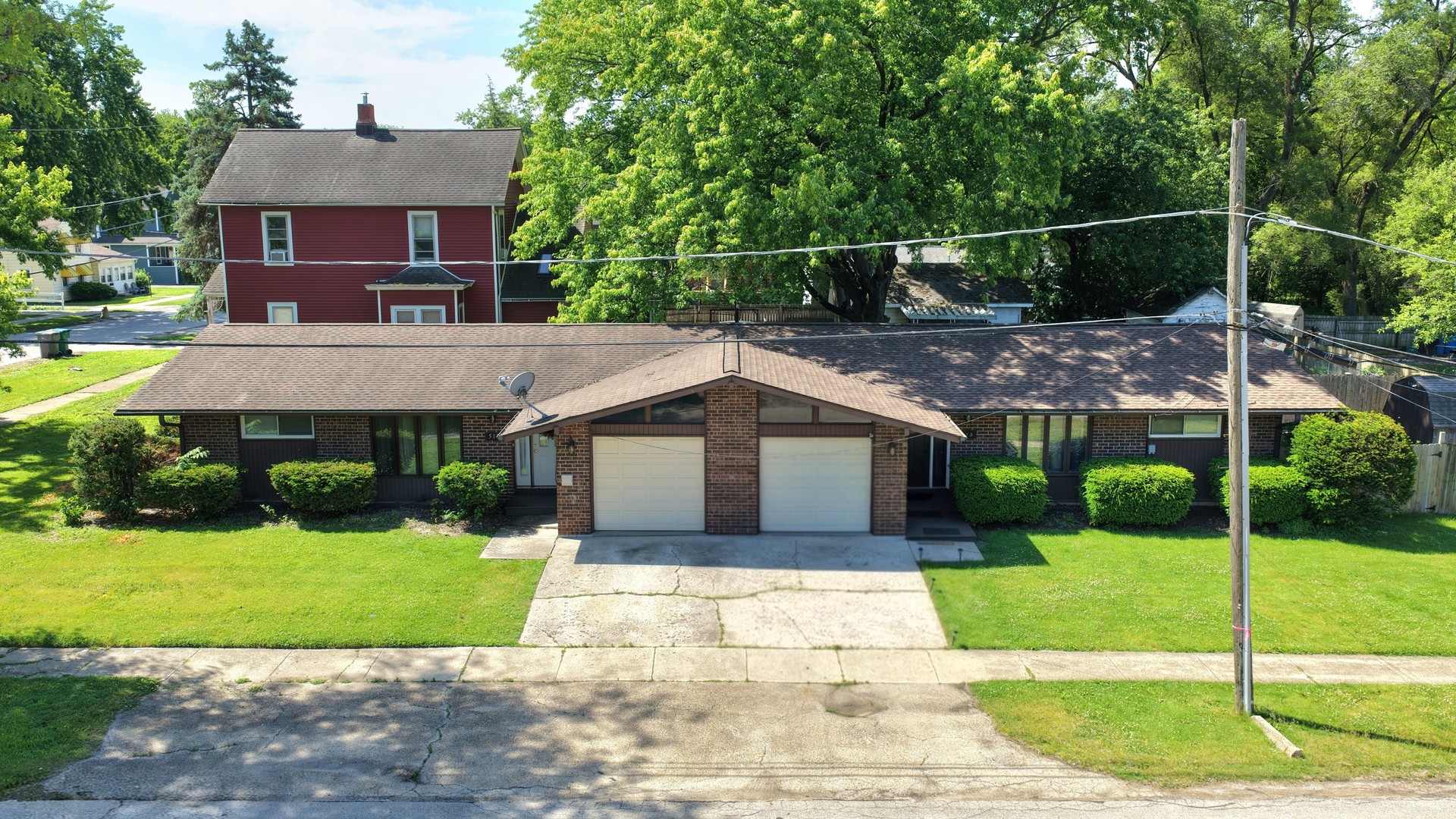 515 South Street Lockport, IL 60441 - Photo 1 of 22 a front view of a house with a garden and yard
