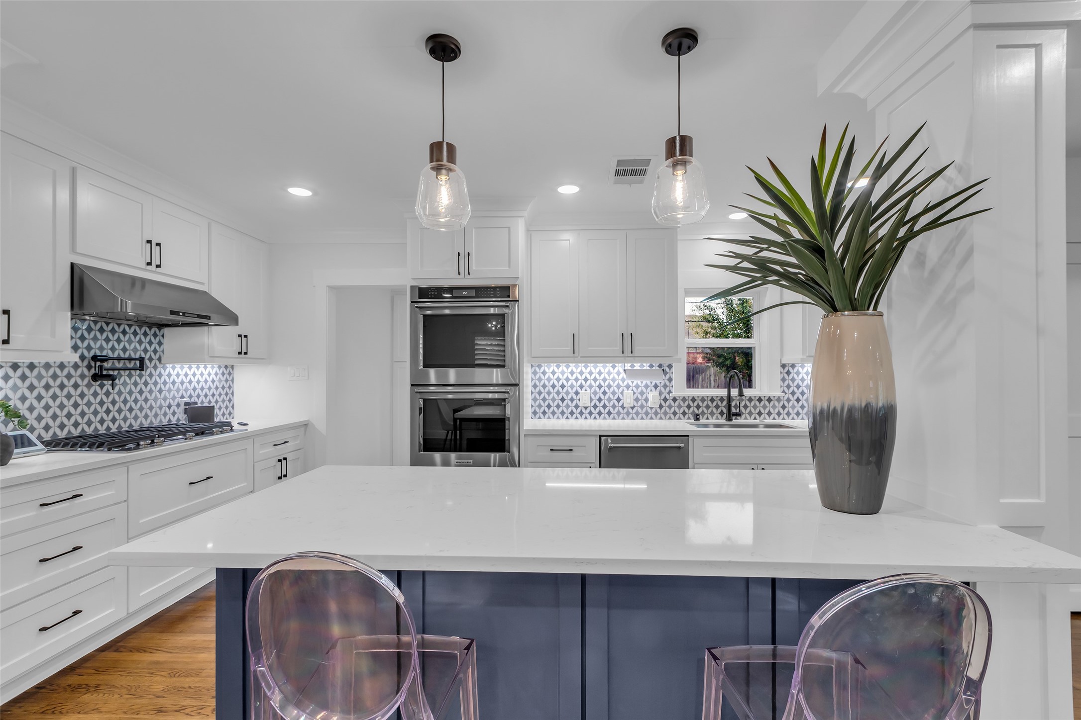 2611 Ruth Street Houston, TX 77004 - Photo 11 of 50 The kitchen island provides extra workspace for cooking and also serves as a spot for casual dining.