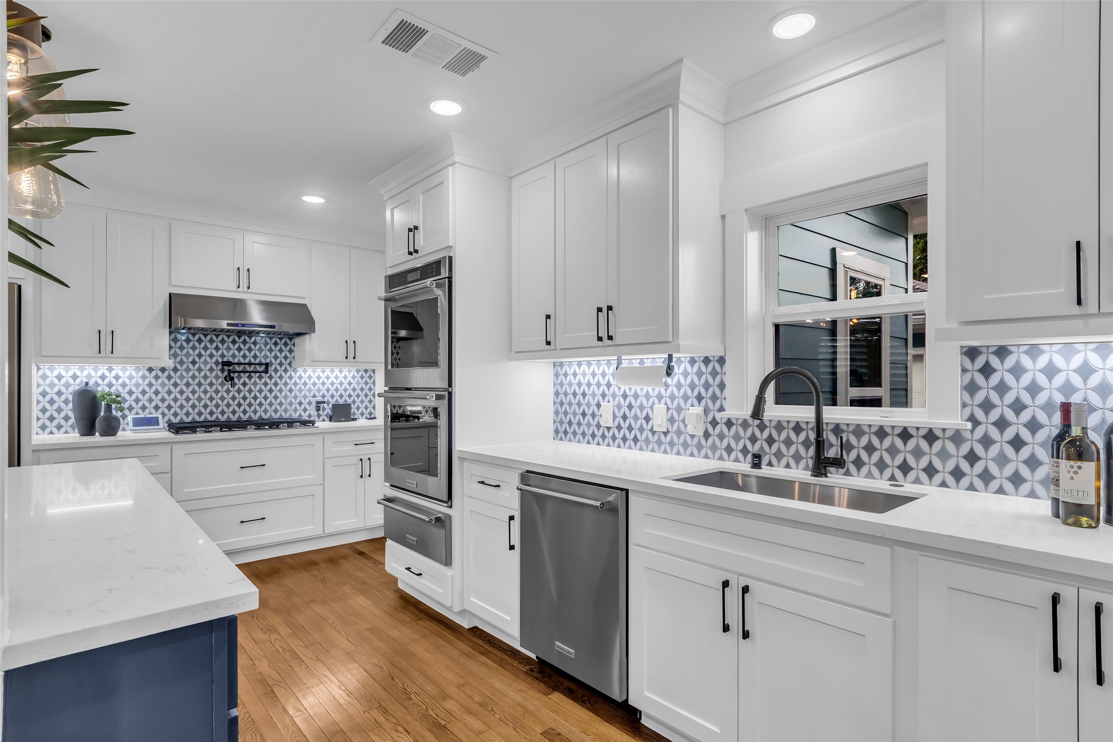 2611 Ruth Street Houston, TX 77004 - Photo 17 of 50 A closer view of the kitchen highlights the layout, showing the arrangement of appliances, counters, and workspace.