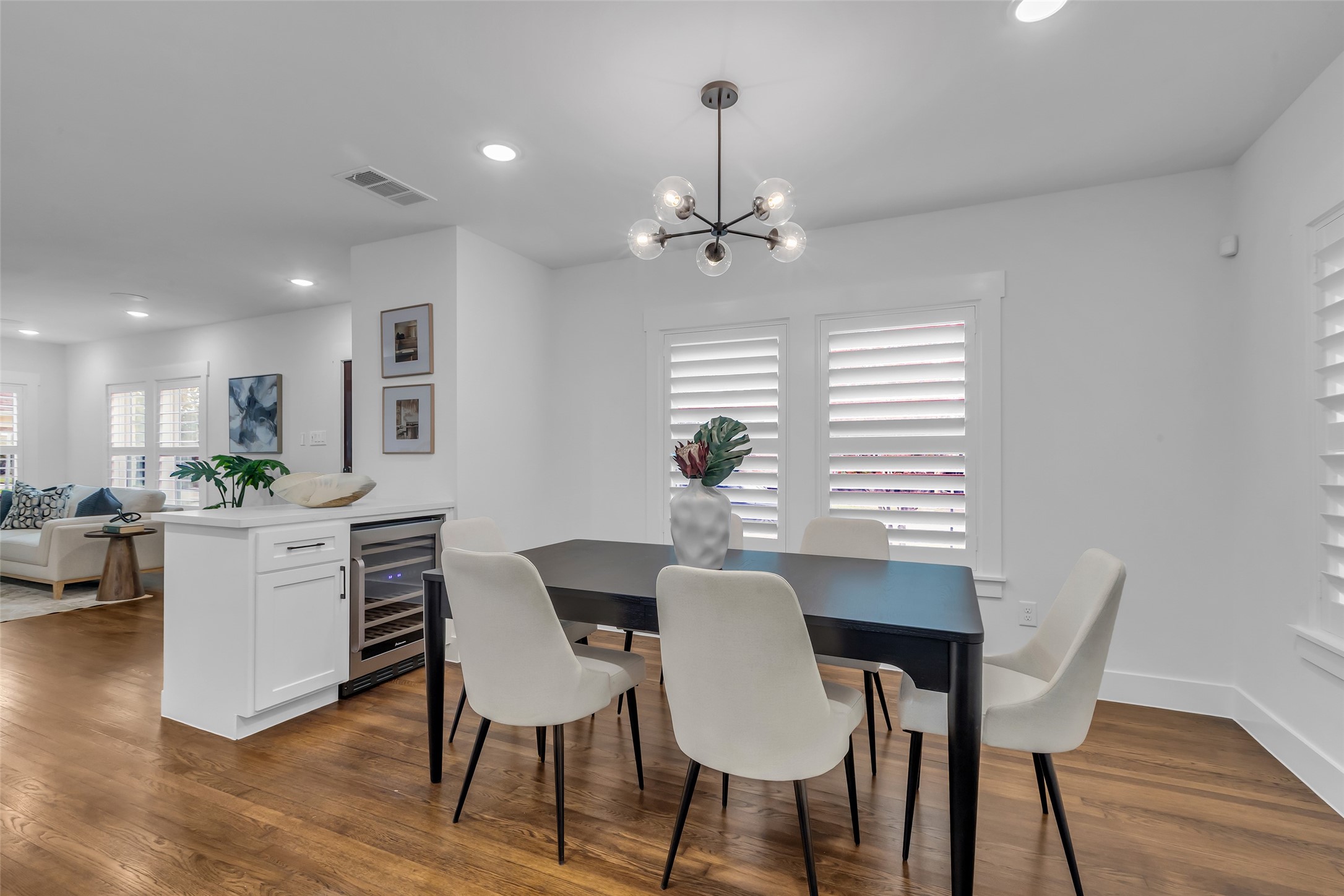 2611 Ruth Street Houston, TX 77004 - Photo 21 of 50 This view shows the dining room and dry bar with built-in wine fridge.
