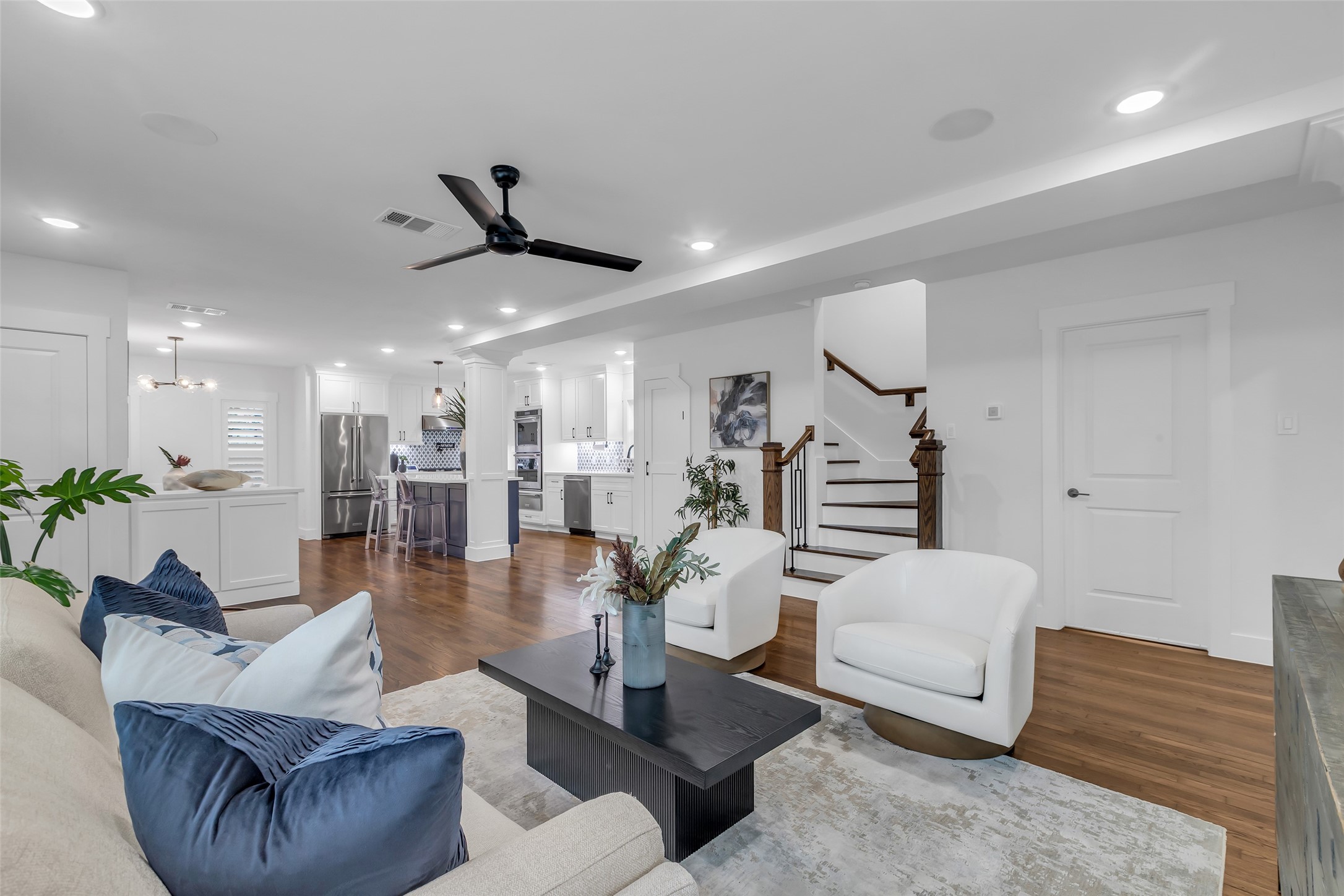 2611 Ruth Street Houston, TX 77004 - Photo 7 of 50 The living area, dining space, and kitchen share an open layout that supports easy movement and everyday functionality.