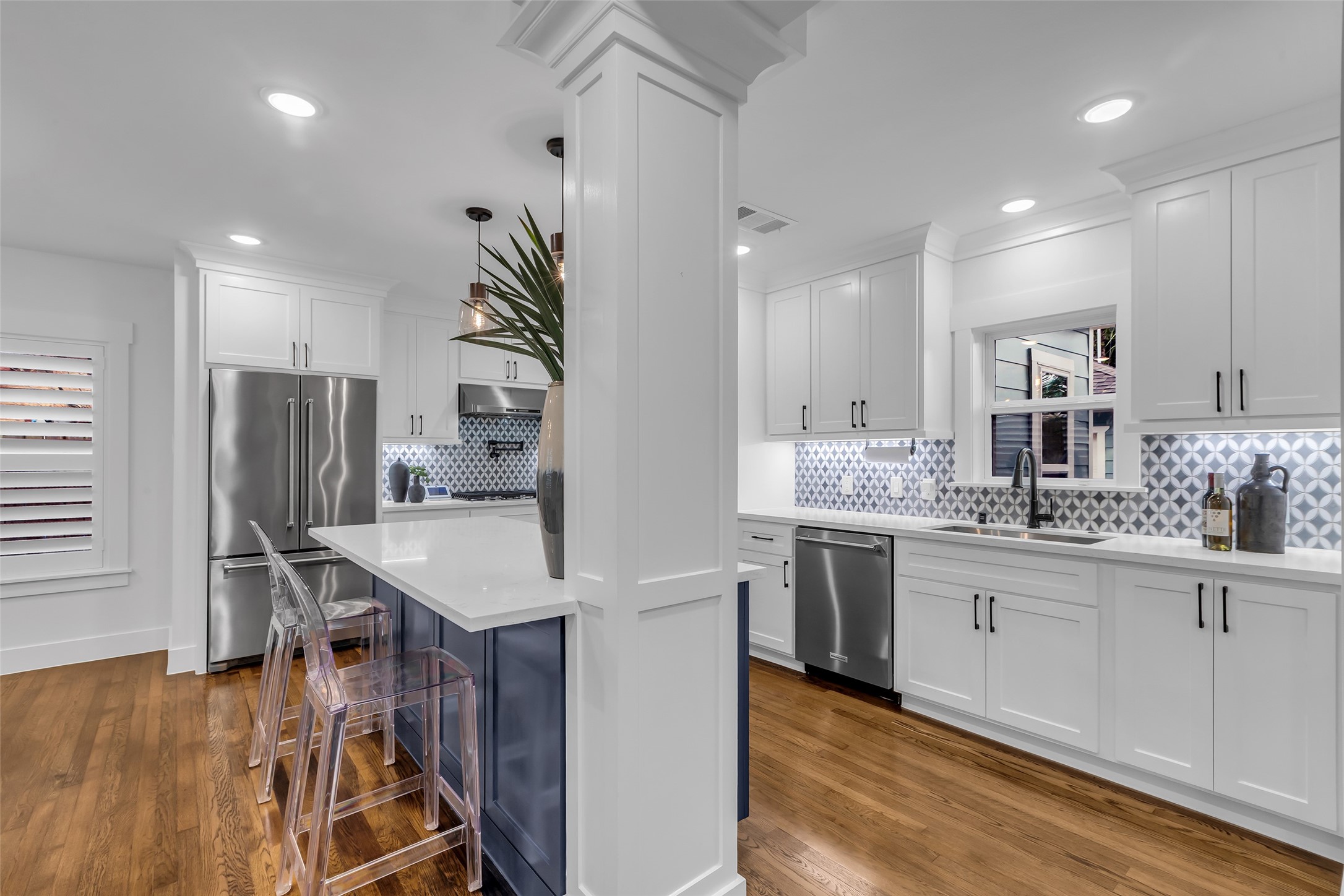 2611 Ruth Street Houston, TX 77004 - Photo 8 of 50 The kitchen features a clean, well-organized layout with a large island that adds extra workspace and functions as a breakfast bar.