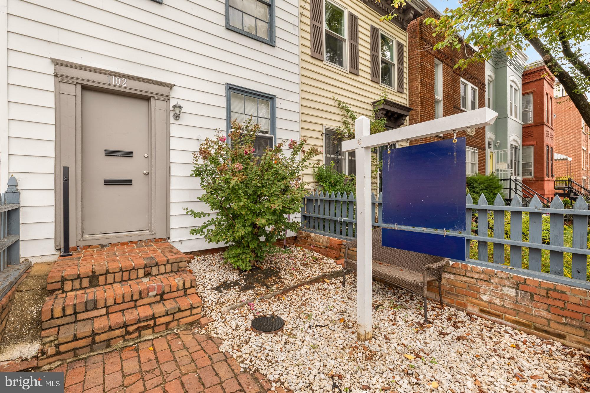 1102 K Street Southeast Washington, DC 20003 - Photo 14 of 30 a view of a house with a yard